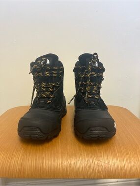 The North Face Men's Black Boots with Yellow-Patterned Laces